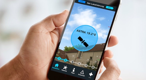 Ein Smartphone, auf dem eine App für die Installation einer Satellitenschüssel geöffnet ist.