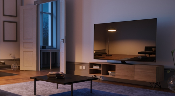 Wohnzimmer mit Fernseher.